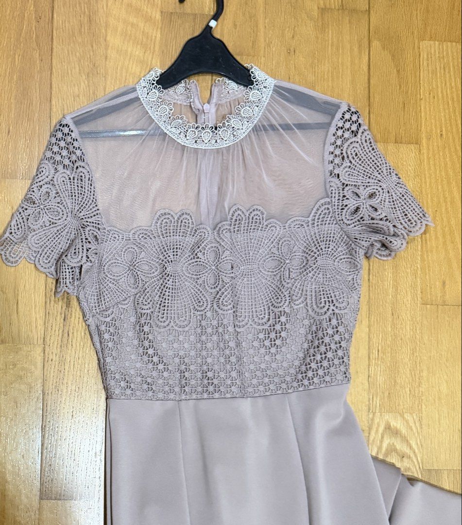 Formal gown (Category: Dresses) located in Muntinlupa City. Submitted by caroucella (Listing ID 1469475462, Image 2). Description: - Color: Mauve - Length: Floor-length straight skirt - Sleeves: Short sleeves - Details: Intricate crochet lace top with sheer mesh at the neck and shoulders - Closure: Back zipper - Condition: Worn once for a wedding, dry cleaned and ready to wear.