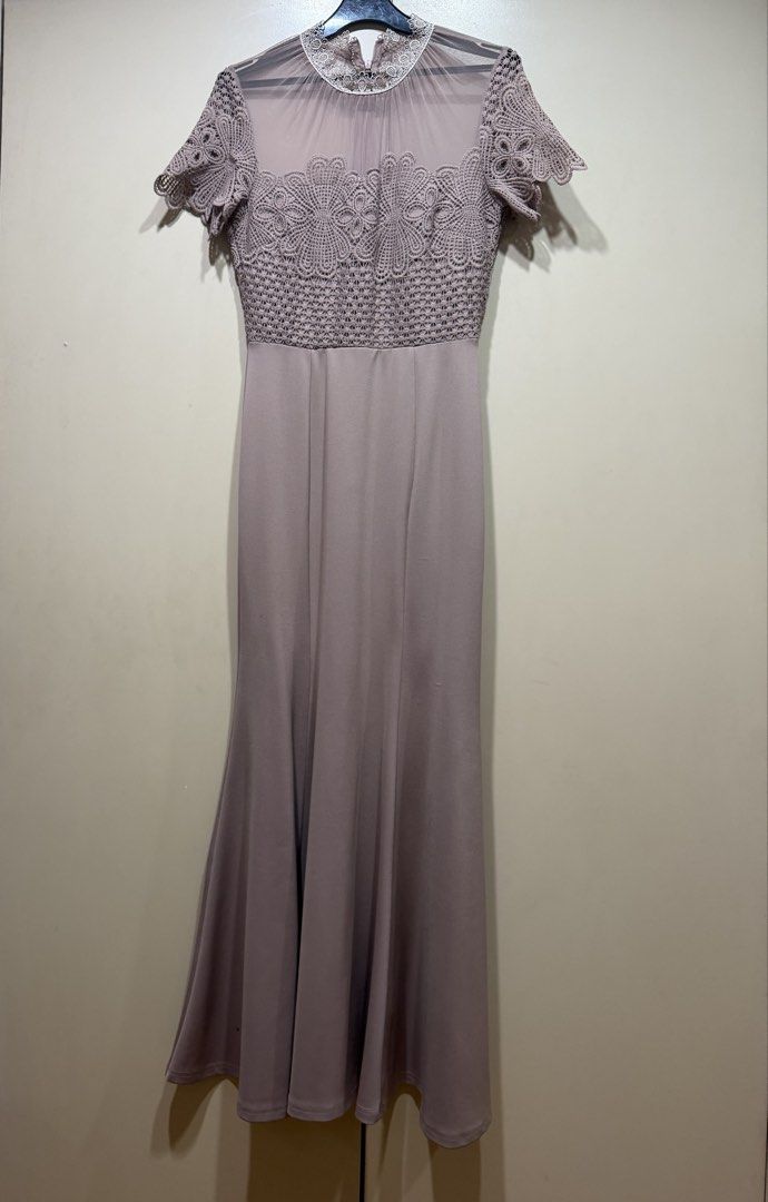 Formal gown (Category: Dresses) located in Muntinlupa City. Submitted by caroucella (Listing ID 1469475462, Image 1). Description: - Color: Mauve - Length: Floor-length straight skirt - Sleeves: Short sleeves - Details: Intricate crochet lace top with sheer mesh at the neck and shoulders - Closure: Back zipper - Condition: Worn once for a wedding, dry cleaned and ready to wear.