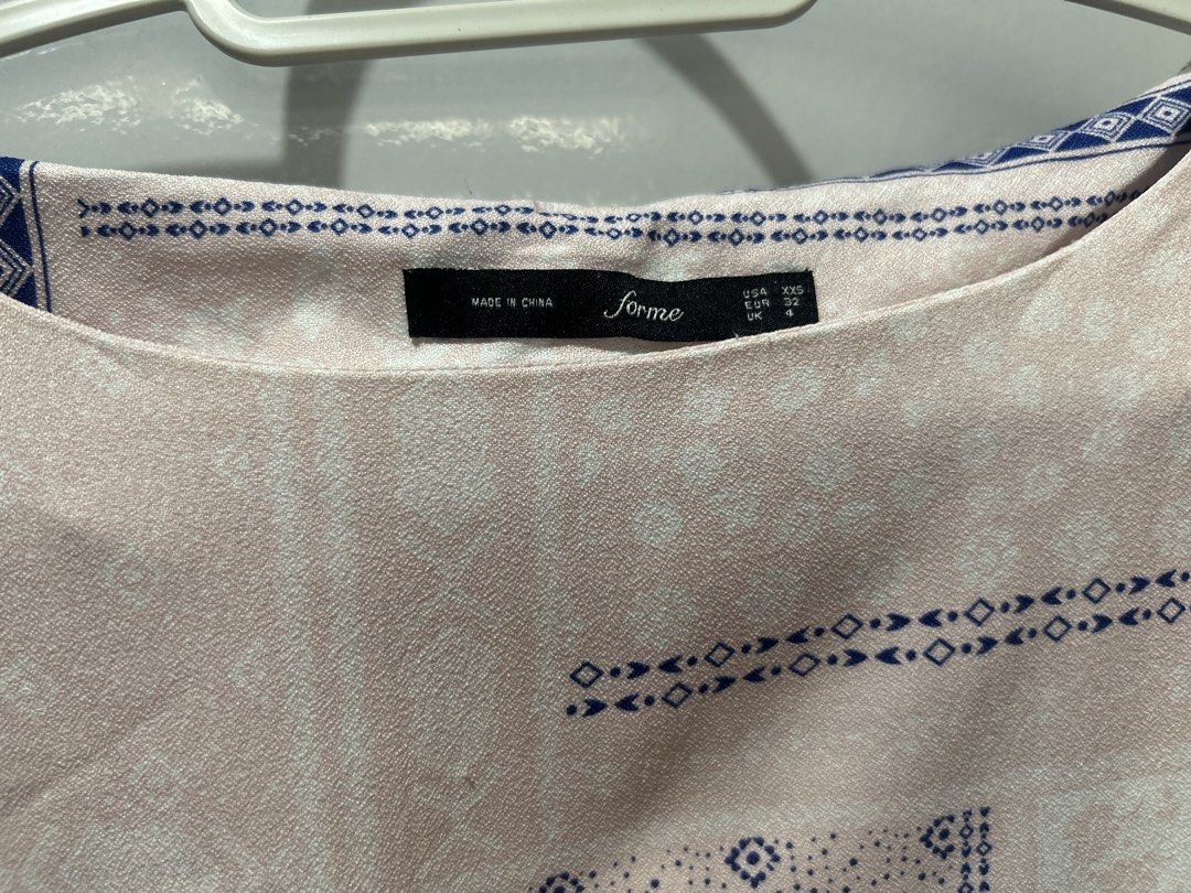 forme Blush Pink & Navy Patchwork Printed Blouse (Category: Shirts) located in Pasig City. Submitted by ladyleslieisletavelarde4902 (Listing ID 1469430105, Image 3). Description: A light, breezy boatneck top featuring a bohemian patchwork tile print in soft blush pink, white floral damask, and deep navy geometric accents. Brand: forme Tag Size: XXS (USA XXS / EUR 32 / UK 4) Recommended Fit: Fits Extra Extra Small to Extra Small (XXS–XS) Shipping 