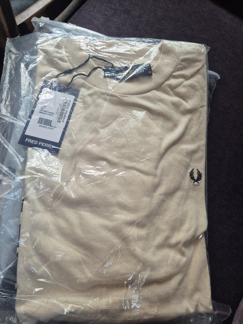 Fred Perry graphic t-shirt assorted colors (Category: Tshirts & Polo Shirts ) located in Daraga. Submitted by nvdp118255967 (Listing ID 1469456696, Image 3). Description: - Authentic Fred Perry t-shirts available for individual purchase or as a bundle - Brand new with original plastic packaging and store tags attached - Classic crew neck design with a bold brand name and large laurel wreath logo on the front - Select styles feature a convenient c