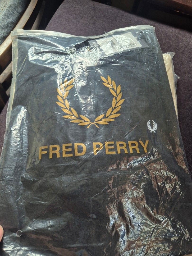 Fred Perry graphic t-shirt assorted colors (Category: Tshirts & Polo Shirts ) located in Daraga. Submitted by nvdp118255967 (Listing ID 1469456696, Image 2). Description: - Authentic Fred Perry t-shirts available for individual purchase or as a bundle - Brand new with original plastic packaging and store tags attached - Classic crew neck design with a bold brand name and large laurel wreath logo on the front - Select styles feature a convenient c