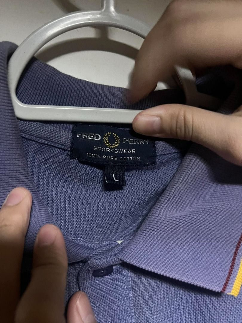 Fred Perry Polo (Category: Tshirts & Polo Shirts ) located in Mandaluyong City. Submitted by santideclutters (Listing ID 1469523897, Image 2). Description: size: 28L 20W (L) color rate: 8.5/10 condition: 9/10 needs washing COLOR MAY VARY DUE TO LIGHTING.