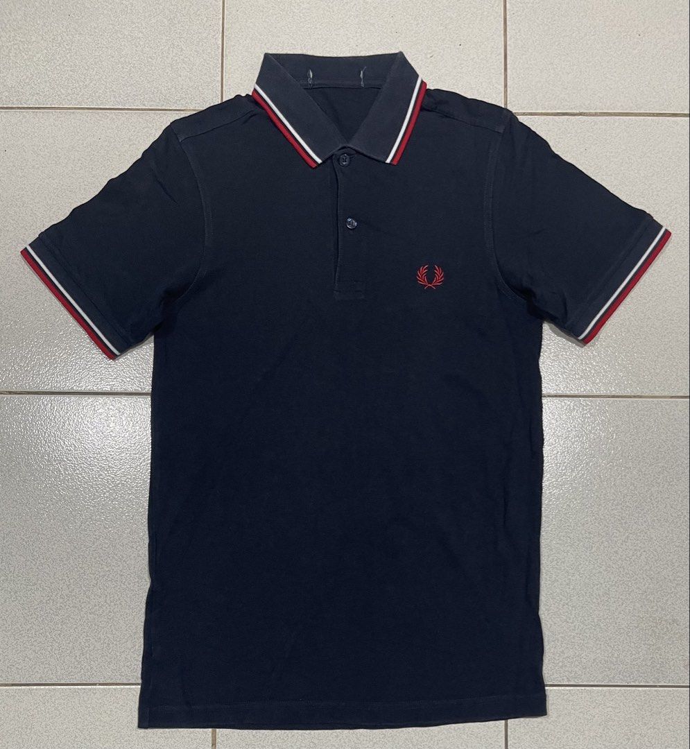 Fred Perry Poloshirt (Category: Tshirts & Polo Shirts ) located in Mandaue City. Submitted by MJ_80 (Listing ID 1469420204, Image 1). Description: Mens Fred Perry Poloshirt Navy Blue Size: Xtra Small Dimes: 16X26 See photos for measurements Collar neck line Cut neck tag Color rate & Condition: 9.8/10 Price: 1350 .