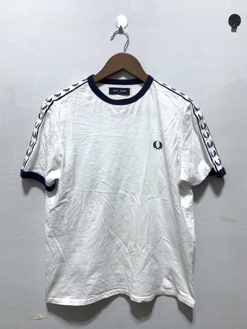FRED PERRY SIDE TAPE T-shirt (Category: Tshirts & Polo Shirts ) located in Caloocan City. Submitted by eightyythrift (Listing ID 1469565254, Image 1). Description: .