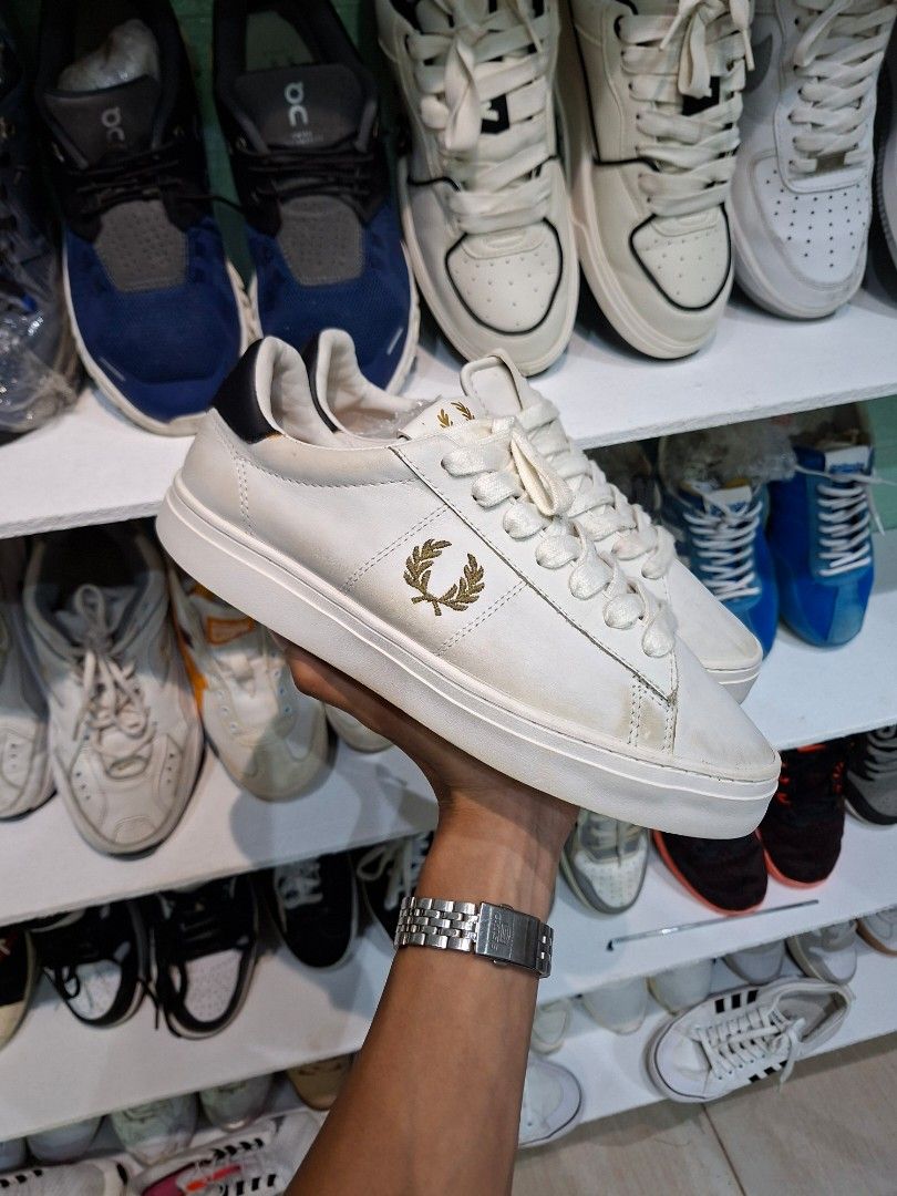 Fred Perry white gold blue sneakers (Category: Casual Shoes) located in Bislig. Submitted by jeloy_13 (Listing ID 1469526651, Image 2). Description: Size 40 Pasok 7-7.5 Excellent condition minimal sign of usage.