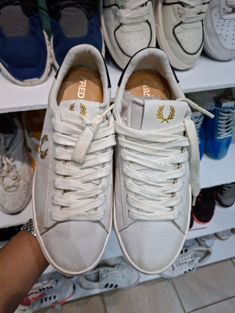 Fred Perry white gold blue sneakers (Category: Casual Shoes) located in Bislig. Submitted by jeloy_13 (Listing ID 1469526651, Image 3). Description: Size 40 Pasok 7-7.5 Excellent condition minimal sign of usage.