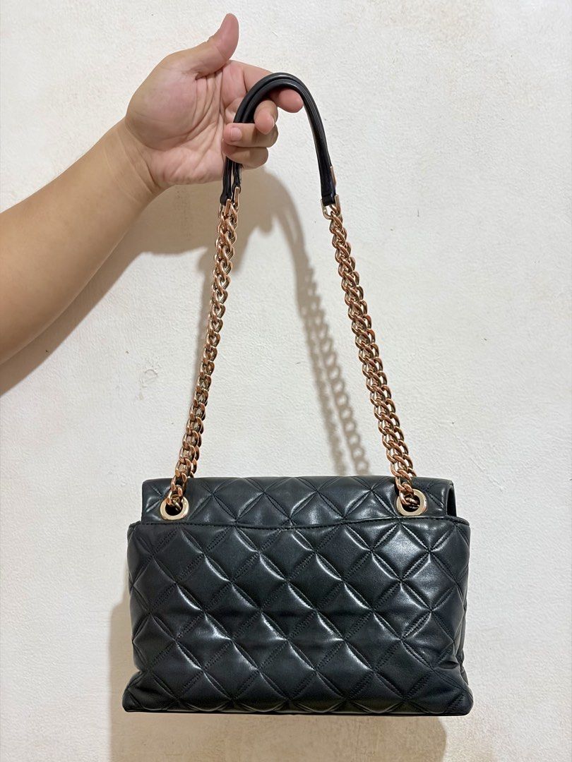 FS: Authentic Kate Spade Natalia Medium Flap Shoulder Bag (Category: Luxury Bags & Wallets) located in Quezon City. Submitted by baessist_z (Listing ID 1469566767, Image 2). Description: FS : Authentic Kate Spade Natalia Medium Flap Shoulder Bag Black Features : - Quilted smooth leather - Two-way spade jacquard lining On hardware logo - Interior slip pocket - Exterior slip pocket .