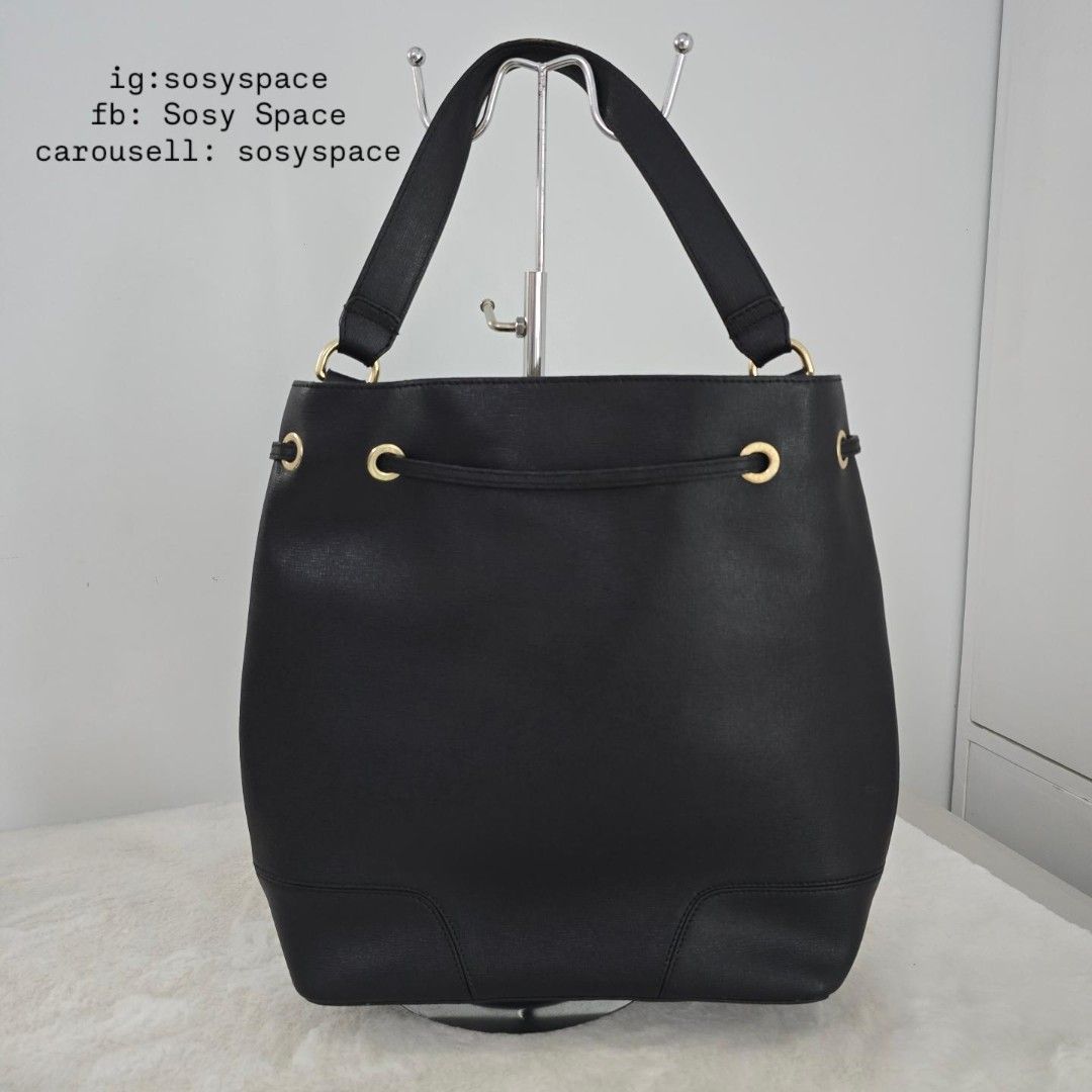 Furla Black Drawstring Bucket Stacy Bag (Category: Luxury Bags & Wallets) located in Lucena. Submitted by sosyspace (Listing ID 1469445016, Image 3). Description: FURLA 01B1P135 Black Stacy Bucket Bag Made of durable scratch resistant saffiano textured calfskin leather. Minimalist gold-toned hardware Deawstring closure 27 x 10 x 31 cm Condition: PRELOVED has signs of use still in good condition for me Final Price: PHP 4,000 + HF + SF 🩵🩵🩵🩵🩵🩵