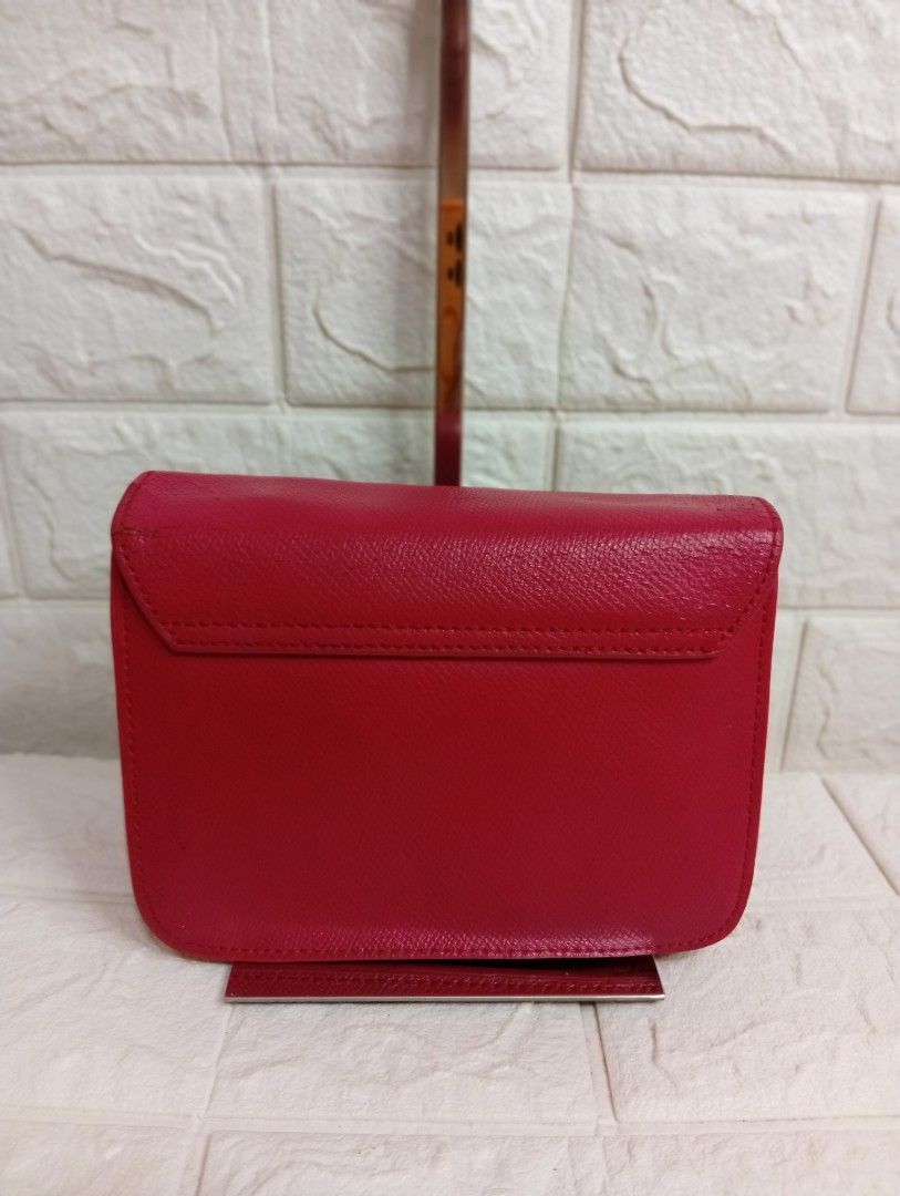 Furla Metropolis Ruby Leather Crossbody Bag (Category: Cross-body Bags) located in Las Pinas. Submitted by etoksi1234 (Listing ID 1469558196, Image 2). Description: Furla Metropolis Mini Crossbody Bag in a ruby red textured leather finish with gold-tone hardware..
