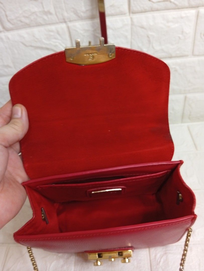 Furla Metropolis Ruby Leather Crossbody Bag (Category: Cross-body Bags) located in Las Pinas. Submitted by etoksi1234 (Listing ID 1469558196, Image 3). Description: Furla Metropolis Mini Crossbody Bag in a ruby red textured leather finish with gold-tone hardware..