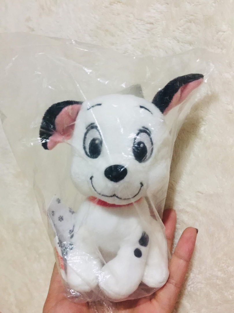 FuRyu Disney 101 Dalmatians Merry Creation Plush (Category: Plushies & Soft Toys) located in Baguio. Submitted by izza_thrifty (Listing ID 1469567611, Image 1). Description: - Official FuRyu Disney 101 Dalmatians plush toy - From the collectible Merry Creation series - Features classic puppy design with black spots, floppy ears, and red collar - Authentic paw print pattern on the tag - Brand new, sealed inside original plastic packaging with tags