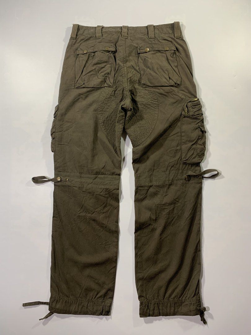 Gallice Galm/Combat Canvas Cargo Pants (Category: Jeans) located in Aurora. Submitted by cpr_garments13 (Listing ID 1469532382, Image 3). Description: Models height 5’6 31 x 32 on tag Measurements •Waist:32 •Thigh:12 •Length:40.5 •Leg opening:9 (adjustable) Like New -11 pockets .