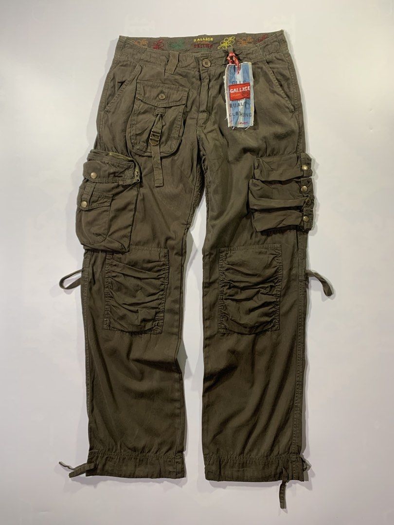 Gallice Galm/Combat Canvas Cargo Pants (Category: Jeans) located in Aurora. Submitted by cpr_garments13 (Listing ID 1469532382, Image 2). Description: Models height 5’6 31 x 32 on tag Measurements •Waist:32 •Thigh:12 •Length:40.5 •Leg opening:9 (adjustable) Like New -11 pockets .