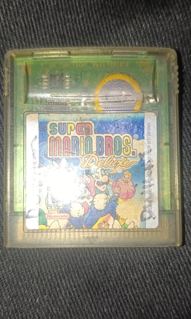 Gameboy Color Game- Super Mario Bros. (Category: Nintendo) located in Caloocan City. Submitted by silentcloud.325f31 (Listing ID 1469565761, Image 1). Description: Good working Conditions Fresh Battery Authentic Faded label with markings.