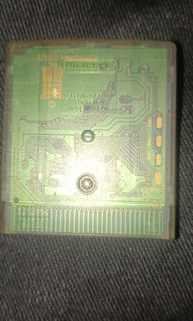 Gameboy Color Game- Super Mario Bros. (Category: Nintendo) located in Caloocan City. Submitted by silentcloud.325f31 (Listing ID 1469565761, Image 2). Description: Good working Conditions Fresh Battery Authentic Faded label with markings.