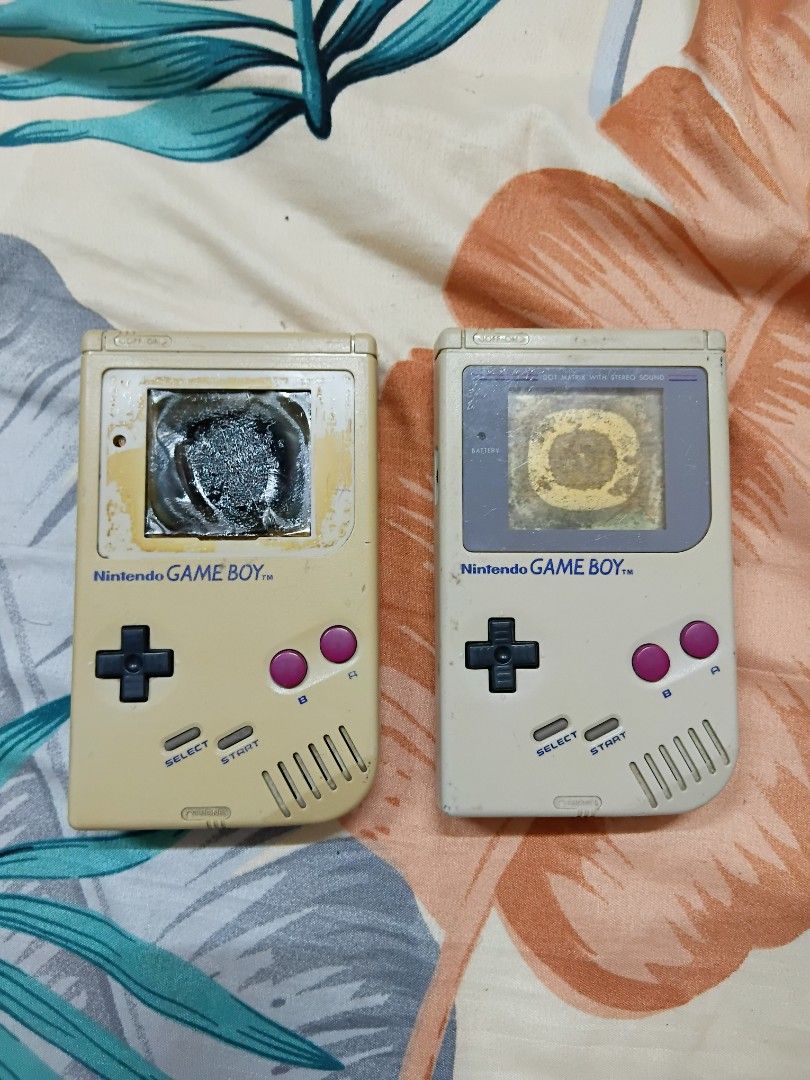 Gameboy DMG Bundle (Category: Nintendo) located in Quezon City. Submitted by coffeeyuki56158 (Listing ID 1469422215, Image 1). Description: please read item description po Gameboy DMG Bundle both may battery cover , both nag power on pa , yung isa na may faceplate may sound , yung walang faceplate mahina sound , both sira na lcd , selling as it is na po , good for marunong mag restore or for your gameboy project or pang display purpose considered