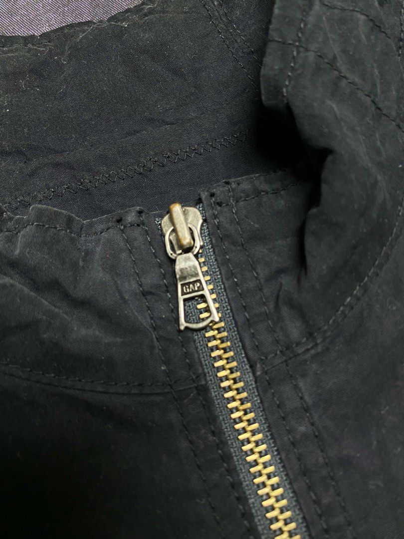 GAP Black Full Zip Jacket XL (Category: Coats, Jackets and Outerwear) located in Cavite. Submitted by bellewii (Listing ID 1469548759, Image 2). Description: - Brand: Gap - Condition: Brand new with tags attached - Size: XL - Color: Black - Origin: Made in Indonesia - Design: High collar with full metal zipper front - Pockets: Multiple zipper pockets on the chest and lower front - Details: Zippered cuffs, Gap branded hardware, and stylish inner l