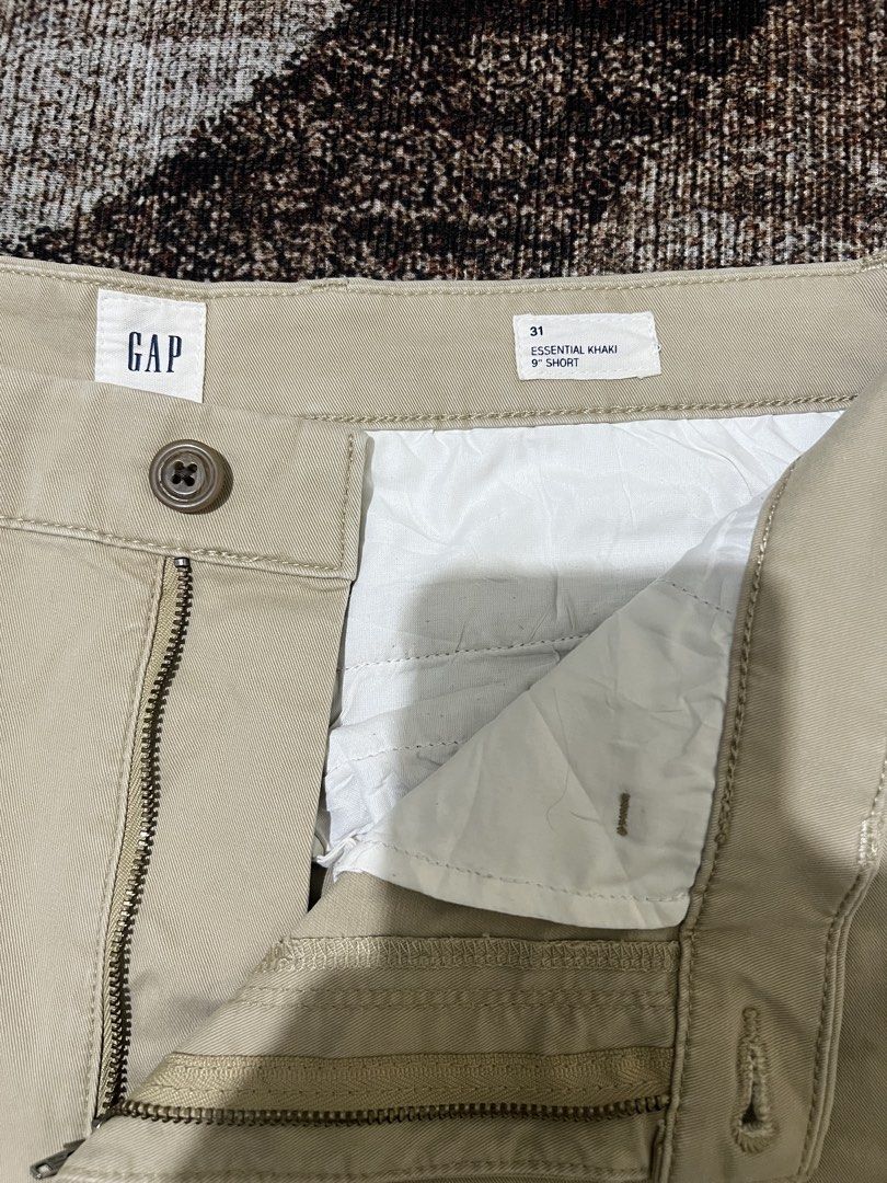 GAP Essential Khaki Shorts (Category: Shorts) located in Rizal. Submitted by ithriftph_ (Listing ID 1469506122, Image 3). Description: 🔻 Details 🔻 GAP Essential Khaki Shorts Authentic Comeplete Tags Waistline: 31" Good fit to 32" Length: 19.5" Leg hole: 10.5 Color rate: 9/10 Condition: 9/10 No issue Price: 300 pesos Reminders: Color may vary due to lighting and your screen resolution. Note: Ready to wear (already washed) Mode of Payment: 📌 Gca
