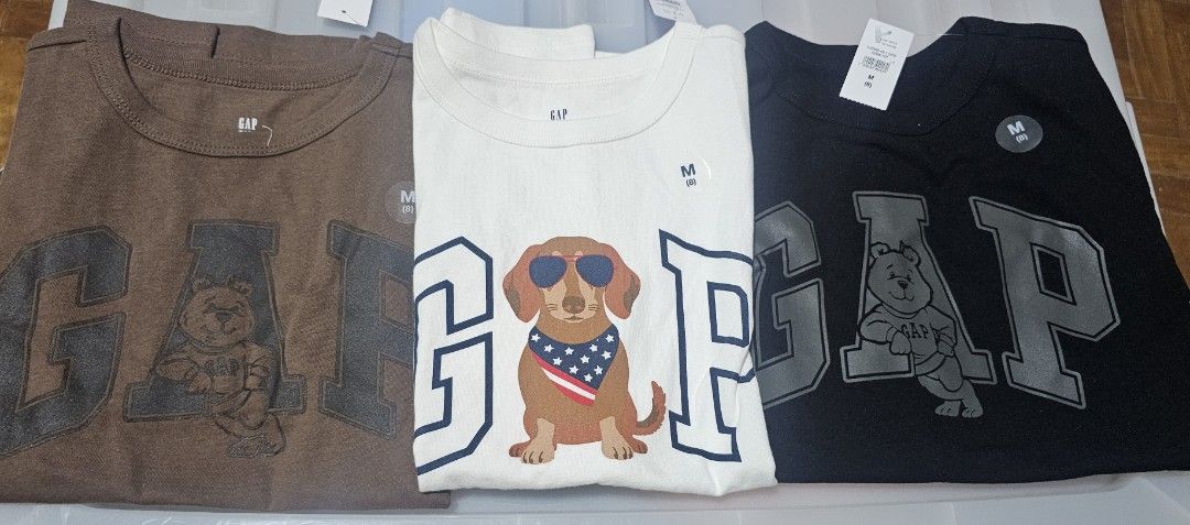 GAP Kids Tshirt (Category: Babies & Kids Fashion) located in Davao. Submitted by dahl957172787 (Listing ID 1469512390, Image 1). Description: GAP tees (Brown, White, Black) - Size: M (8) - Condition: Brand new with tags attached - Material: Soft 100% cotton - Style: Crew neck, great for casual everyday wear 1350 each .