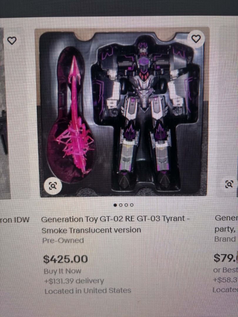 Generation Toy GT-02 Tyrant IDW (B2 bomber megatron) - 3rd parTy (Category: Figurines & Statues) located in Taguig. Submitted by livehorse.8cf1df (Listing ID 1466294749, Image 2). Description: - Custom black and purple colorway - Includes a matching dark display stand - Detailed robotic sculpt with sharp shoulder armor - Built-in arm cannon feature - Solid build with metallic paint accents - Excellent display piece for collectors.
