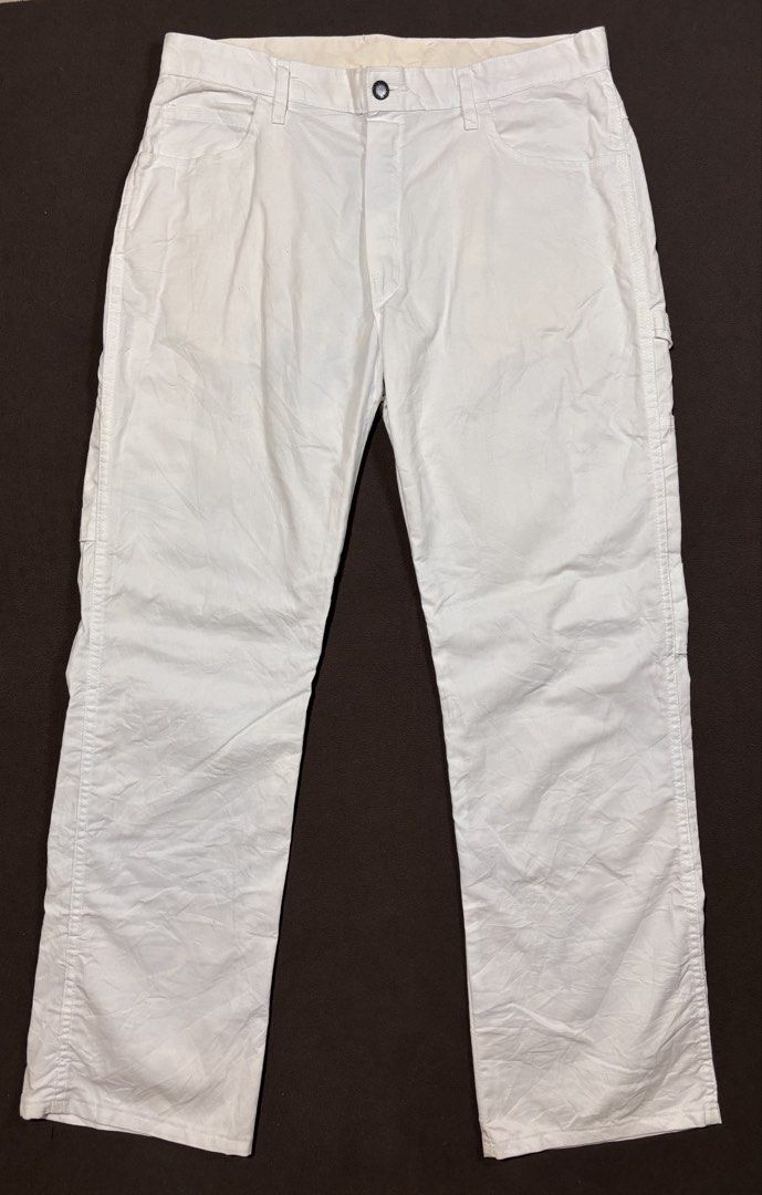 Genuine Dickies White Carpenter Pants (Category: Jeans) located in Mabalacat. Submitted by _limitlessfashion (Listing ID 1469425238, Image 1). Description: - Brand: Genuine Dickies - Color: Classic White - Size 34-35 - Length 42 - Hem 9.5 - No issue, need wash only - Material: Heavy-duty, durable cotton blend - Fit: Relaxed fit for all-day comfort - Features: Multiple side utility pockets, hammer loop, branded black metal button closure, and wove