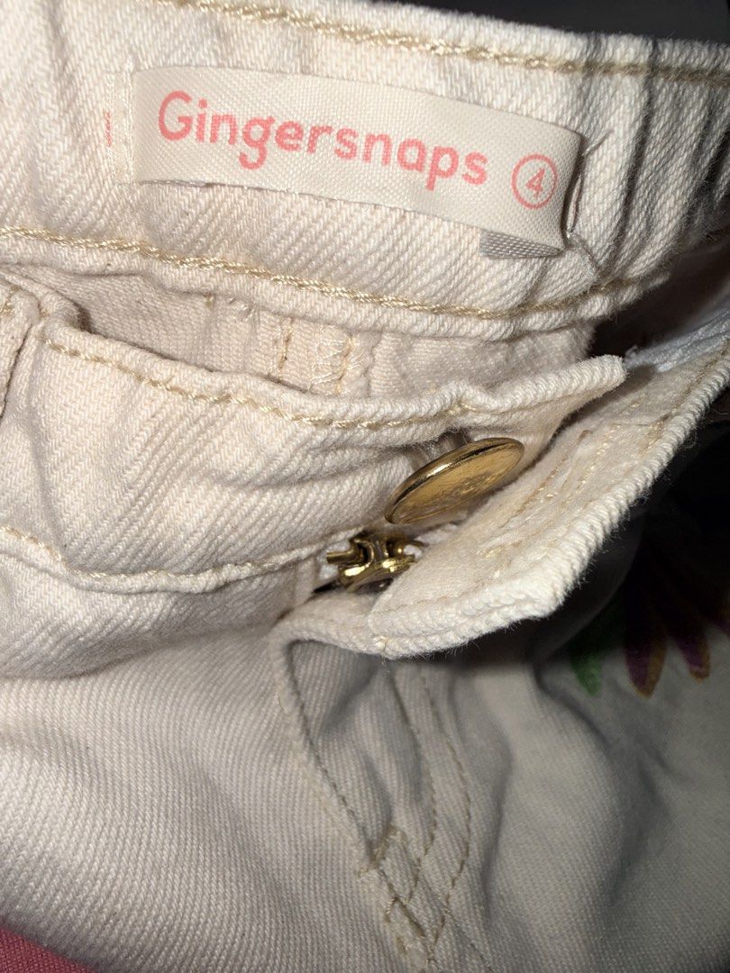 Gingersnaps Embroidered Parrot Banana Pants (Category: Babies & Kids Fashion) located in Cabanatuan. Submitted by baju101 (Listing ID 1469505501, Image 3). Description: - Brand: Gingersnaps - Size: 4 (Tag) (may fit 3y/o) - Color: Off-white denim - Design: Cute tropical embroidery with a parrot on the right leg and bananas on the left - Features: Zip fly with button closure, belt loops, and back patch pockets - Measurements: Waist 26 cm across, To