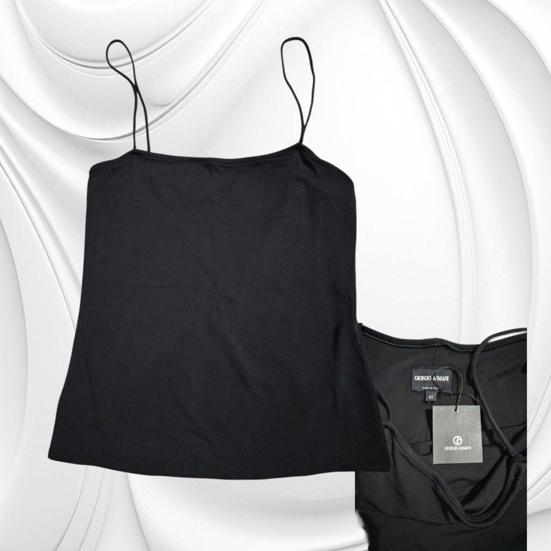 Giorgio Armani Black Cami Top Size 42 (Category: Sleeveless) located in Paranaque City. Submitted by calm_youngstore7 (Listing ID 1469447442, Image 1). Description: - Brand: Giorgio Armani - Size: 42 (Made in Italy) - Material: 93% Viscose, 7% Elastane (soft stretch fabric) - Design: Double spaghetti straps, plain black back with center seam - Condition: Brand tags attached to collar label, original tag included - Care: Dry clean only.