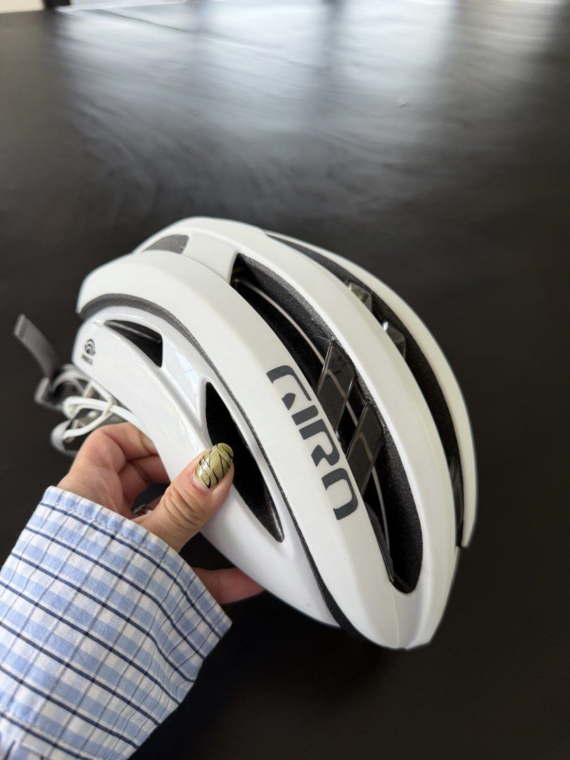Giro Aries Spherical MIPS Bicycle Helmet White (Category: Bicycles) located in Pasig City. Submitted by francesca.valdes98 (Listing ID 1469496869, Image 3). Description: - Brand: Giro Aries Spherical Road Cycling Helmet - Color: White with stylish silver straps - Size: Small (51-55cm head circumference) - Safety: Advanced MIPS safety system - Design: Ultra-lightweight with superior ventilation channels - Condition: Flawless, spotless shell, zero 