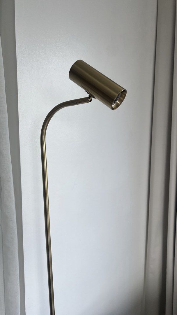 Gold Floor Lamp with White Marble Side Table (Category: Lighting) located in Pasig City. Submitted by thestylesisters (Listing ID 1469421065, Image 1). Description: - 2-in-1 design: Combines a reading light and a small coffee table - Space-saving: Takes up very little floor space, perfect beside a sofa or bed - Elegant aesthetic: Gold tone metal finish with a white marble top - Sturdy build: Features a heavy cylindrical marble base - Adjustable l