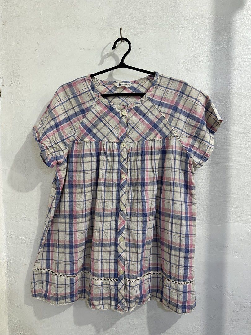 goodday plaid short sleeve button up blouse size 160 (Category: Blouses) located in San Jose del Monte. Submitted by bizzybeebyhgc (Listing ID 1469432959, Image 2). Description: - Brand: Goodday - Color/Pattern: Cream base with pink & blue plaid - Features: Button-up front, round neckline, gathered yoke panel - Detail: Delicate lace trim along the bottom hem - Material: Soft and lightweight.