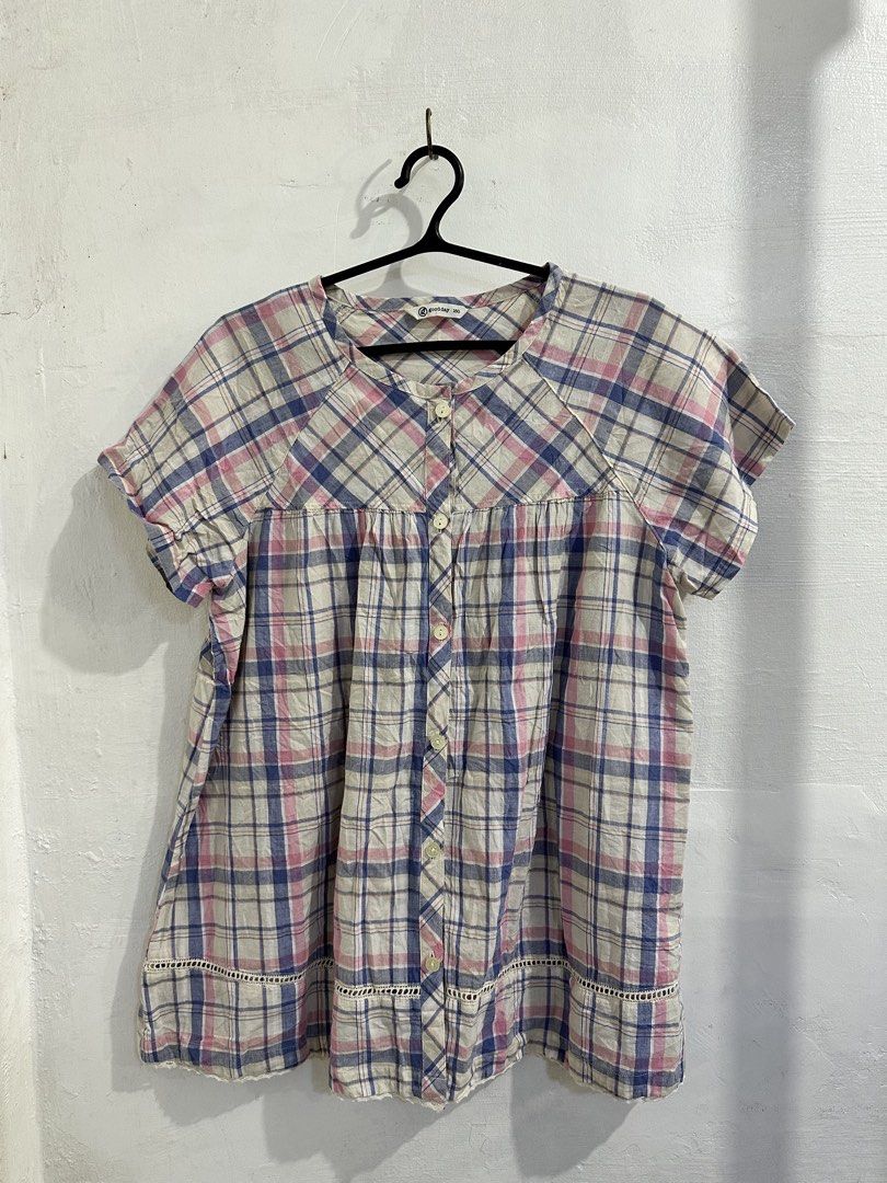 goodday plaid short sleeve button up blouse size 160 (Category: Blouses) located in San Jose del Monte. Submitted by bizzybeebyhgc (Listing ID 1469432959, Image 1). Description: - Brand: Goodday - Color/Pattern: Cream base with pink & blue plaid - Features: Button-up front, round neckline, gathered yoke panel - Detail: Delicate lace trim along the bottom hem - Material: Soft and lightweight.