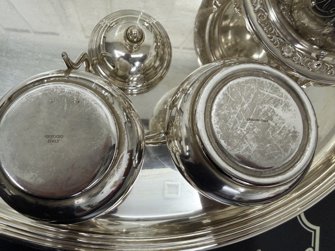 Greggio Italy Silver Tea Set with Tray (Category: Coffee & Tea Tableware) located in Makati City. Submitted by monkeykingo (Listing ID 1469542751, Image 3). Description: - Complete silver tea and coffee service made in Italy by Greggio. - Includes large serving tray, coffee pot, teapot, sugar bowl with lid, creamer, and covered butter dish with domed lid. - Traditional ornate handles and finials. - Stamped Greggio Italy on the bottom of the piece