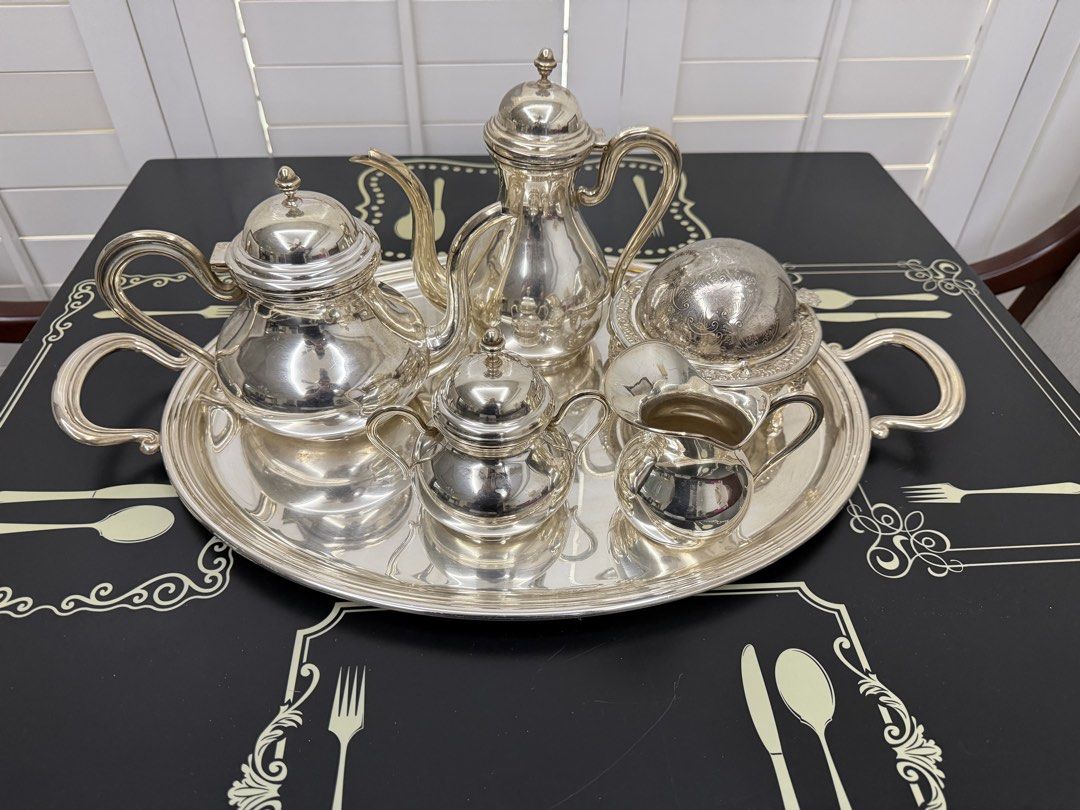 Greggio Italy Silver Tea Set with Tray (Category: Coffee & Tea Tableware) located in Makati City. Submitted by monkeykingo (Listing ID 1469542751, Image 1). Description: - Complete silver tea and coffee service made in Italy by Greggio. - Includes large serving tray, coffee pot, teapot, sugar bowl with lid, creamer, and covered butter dish with domed lid. - Traditional ornate handles and finials. - Stamped Greggio Italy on the bottom of the piece