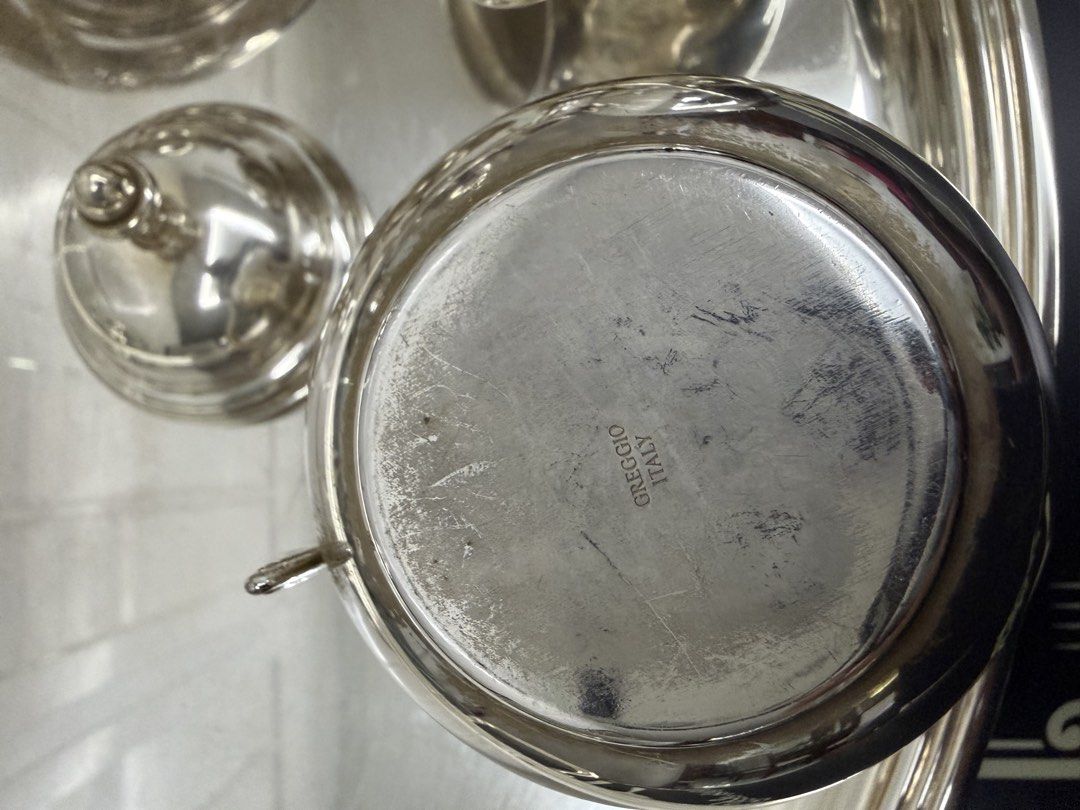 Greggio Italy Silver Tea Set with Tray (Category: Coffee & Tea Tableware) located in Makati City. Submitted by monkeykingo (Listing ID 1469542751, Image 2). Description: - Complete silver tea and coffee service made in Italy by Greggio. - Includes large serving tray, coffee pot, teapot, sugar bowl with lid, creamer, and covered butter dish with domed lid. - Traditional ornate handles and finials. - Stamped Greggio Italy on the bottom of the piece