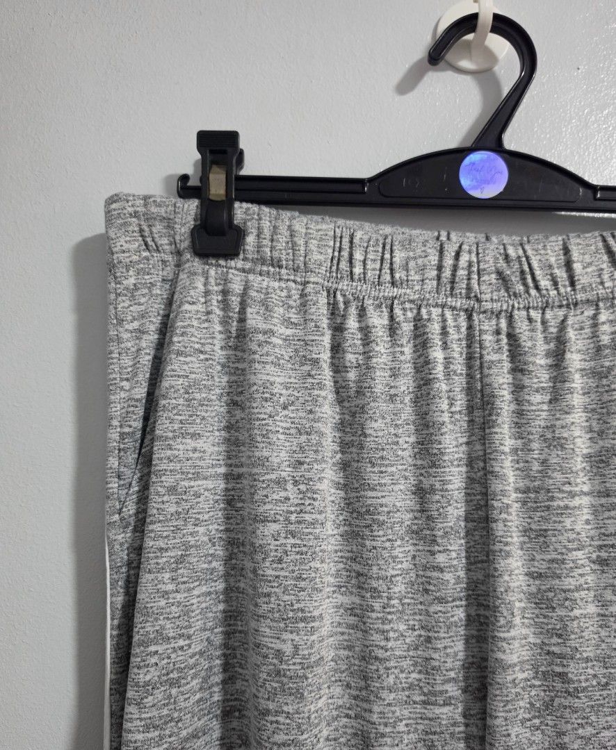 Grey Heather Joggers Sweatpants with White Side Stripes (Category: Other Bottoms) located in Paranaque City. Submitted by franinnashop (Listing ID 1469453177, Image 3). Description: Declutter - Color/Pattern: Grey heather with contrasting white side stripes - Fit: Relaxed fit with a comfortable, stretchy elastic waistband - Features: Convenient side pockets - Best For: Lounging at home or running errands - Measurements: Waist 32-40 inches | Lengt
