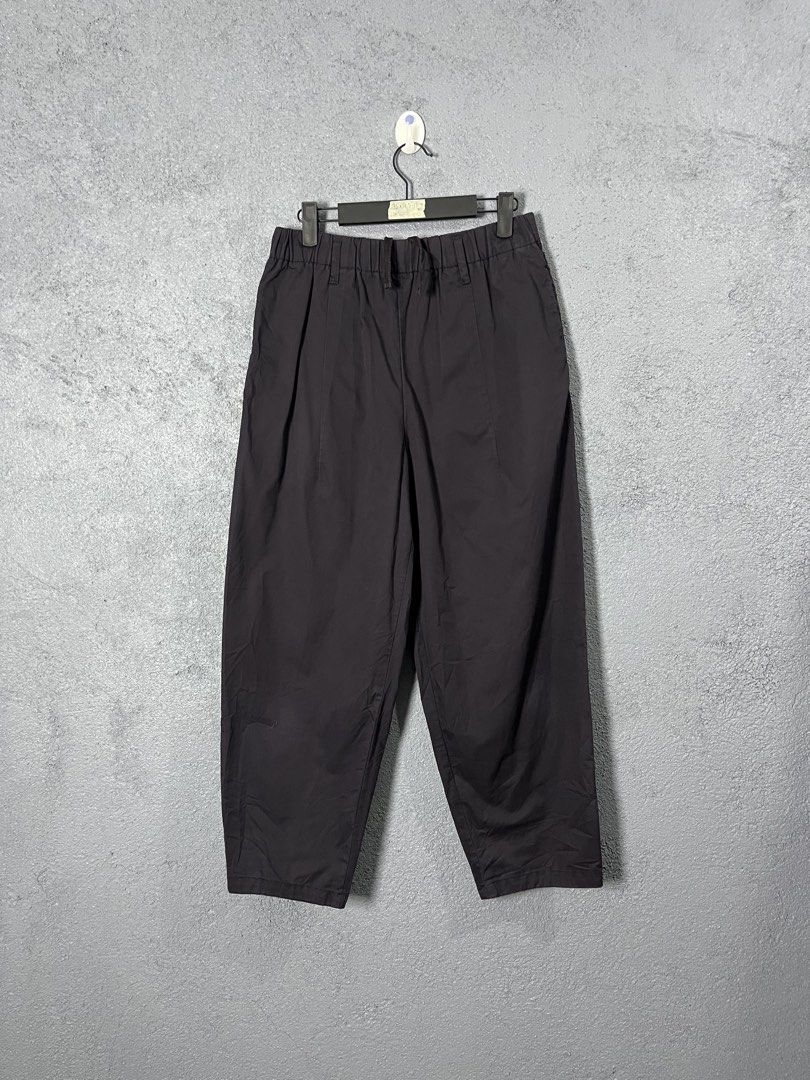 GU Black Drawstring Casual Pants Size S (Category: Joggers) located in Famy. Submitted by basicthrifted (Listing ID 1469405479, Image 1). Description: - Brand: GU - Color: Black - Size: S - Waist: Elastic waistband with built-in drawstring for easy adjustment - Fit: Straight-leg cut with stylish crease detailing down the front - Fabric: Lightweight and comfortable for daily wear - Measurements (from hanger tag): 36 x 14.5 - 17.5 - Condition: Clea