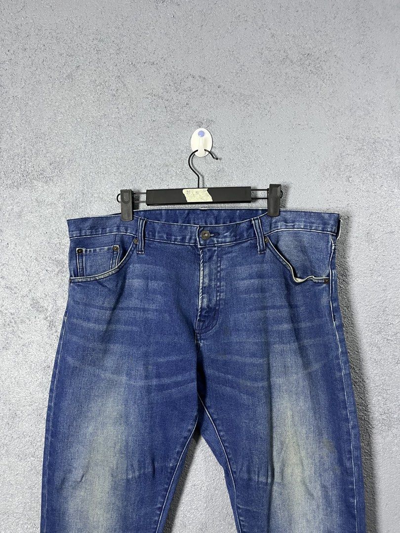 GU Blue Denim Jeans Size 39 x 38 (Category: Jeans) located in Famy. Submitted by basicthrifted (Listing ID 1469404626, Image 2). Description: - Style: Classic blue denim jeans with a stylish washed finish - Fit & Size: Tagged 39 x 38 measurements - Material: 99% cotton, 1% polyurethane blend with a comfortable hint of stretch - Features: Traditional five-pocket setup and secure button waist closure - Versatility: Perfect everyday staple, easy to 