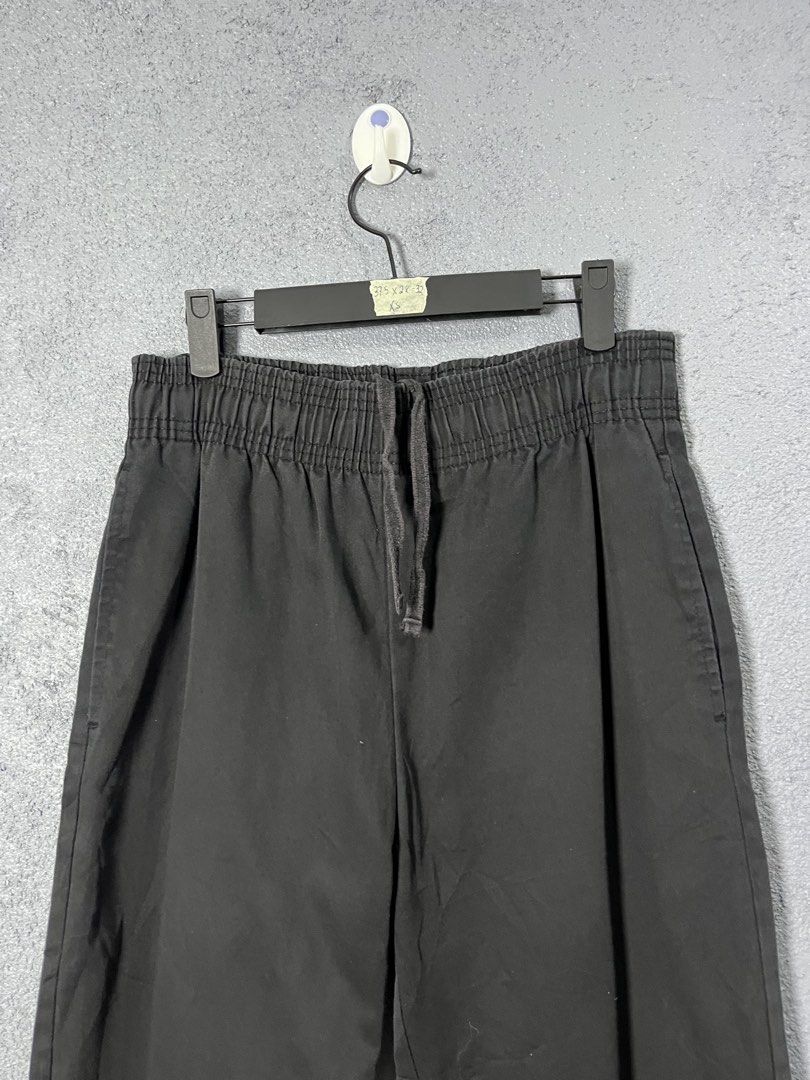 GU Chef Black Drawstring Casual Pants Size XS (Category: Joggers) located in Famy. Submitted by basicthrifted (Listing ID 1469405296, Image 2). Description: - Brand: GU - Color: Black - Size: XS - Material: 61% cotton, 39% polyester - Fit: Straight cut leg with elastic drawstring waistband - Condition/Details: Clean tag inside (Style No. 321-339518), great for daily wear.