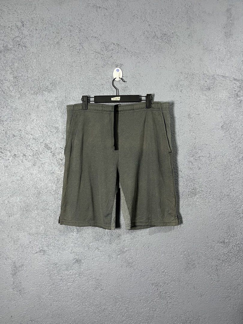 GU Gray Active Drawstring Shorts Size M (Category: Shorts) located in Famy. Submitted by basicthrifted (Listing ID 1469404749, Image 1). Description: - Brand/Model: GU Gray Shorts - Size: M (Fits waist 76-84cm) - Material: 100% lightweight and breathable polyester - Features: Adjustable black drawstring waistband and side pockets - Condition: Clean inside tag - Best for: Workouts or casual lounging.
