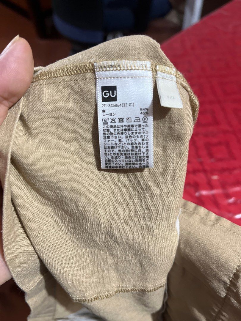 GU Linen Blend Button-Up Vest (Category: Sleeveless) located in Marikina City. Submitted by sakura_07 (Listing ID 1469568163, Image 2). Description: - Brand: GU - Color: Beige khaki - Material: 54% linen, 46% rayon blend - Design: V-neck, 4 front buttons, 2 lower patch pockets - Fit: Standard fit with clean interior lining - Style: Lightweight summer layering piece.