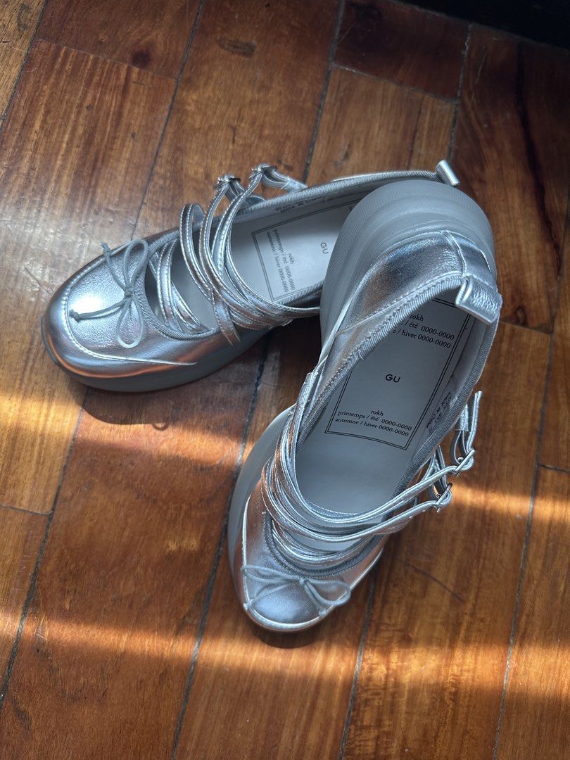 GU x rokh Silver Platform Ballet Sneakers Size S (Category: Sneakers) located in Pasig City. Submitted by abbygaab (Listing ID 1469405773, Image 2). Description: - Brand/Collab: GU x rokh - Style: Silver platform shoes with multi-strap adjustable buckles and cute front bow detail - Sole: Chunky rubber sole with great grip pattern - Size: S (JP 22.5, US 5.5, EUR 35) - Condition: Clean, soles look completely unworn - Used once.