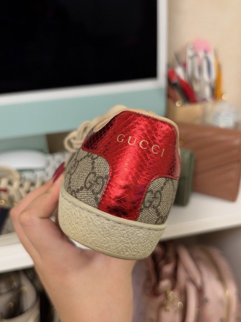 🏷️ gucci ace sneaker (9W) (Category: Sneakers) located in Pasay City. Submitted by erickaolalu (Listing ID 1469504476, Image 2). Description: •gg supreme canvas with signature red & blue web stripe • mismatched metallic snake-effect heels ❤️💙 •gold-tone eyelets & leather lining • good pre-loved condition • shoes only, no box or dustbag • delivery: grab express (from pasay).