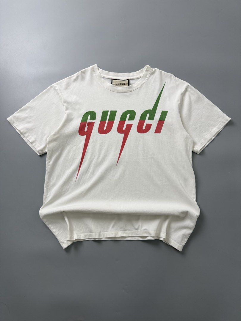 Gucci blade (Category: Tshirts & Polo Shirts ) located in Pila. Submitted by villanueva80826 (Listing ID 1469522524, Image 1). Description: Gucci blade Size:large •Width:22 •Length:28 •Condition:9/10 •Color rate:9/10 Mine:480 +Shipping fee Issue:sign of usage like pinholes on stitch di noticeable and stain need deep wash Still in good for psg condition Still wearable .
