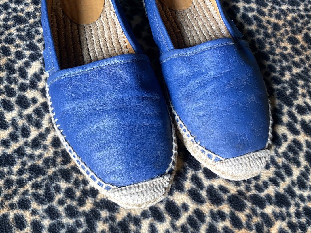 Gucci Blue Leather GG Embossed Espadrilles (Category: Sneakers & Footwear) located in Cabuyao City. Submitted by heran_nn (Listing ID 1469411860, Image 3). Description: - Brand: Gucci -Size 39 - Style: Slip-on espadrilles - Color: Royal blue - Material: Premium leather with all-over embossed GG monogram - Sole: Traditional jute braided sole with stitched trim - Details: Small embossed Gucci side tag, interior heel stamped with serial number 56719