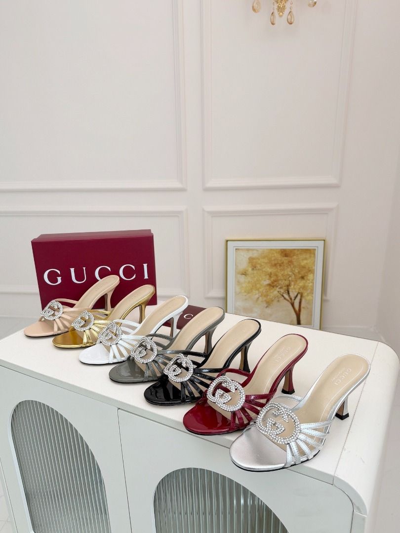 Gucci Crystal Interlocking G Mules Heels Grey(High-end custom model） (Category: Heels) located in Pasay City. Submitted by thesky-- (Listing ID 1469469709, Image 2). Description: - Brand: Gucci - Style: High heel mules with strappy front and stiletto heels - Material: Grey patent leather - Detail: Rhinestone-encrusted interlocking G logo - Inclusions: Original box and dust bag included - Note: Other colors available, feel free to ask!.