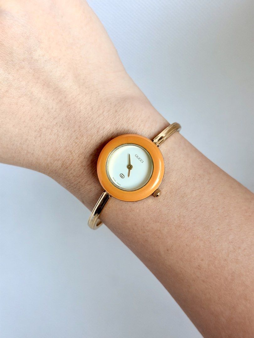 Gucci Interchangeable Bezel 11/12 (Category: Women's Watches) located in Manila. Submitted by vibeandvintage (Listing ID 1469452855, Image 2). Description: ⌚️Gucci Interchangeable Bezel 11/12 •Ladies •Quartz movement •Gold plated case and bracelet •White dial •Medium size bangle (6.5 inches) •26mm case diameter (excluding crown) •With signs of usage •All-original watch head and bangle •Good working condition •Complete 6 bezels and box 💵Price: ₱ 