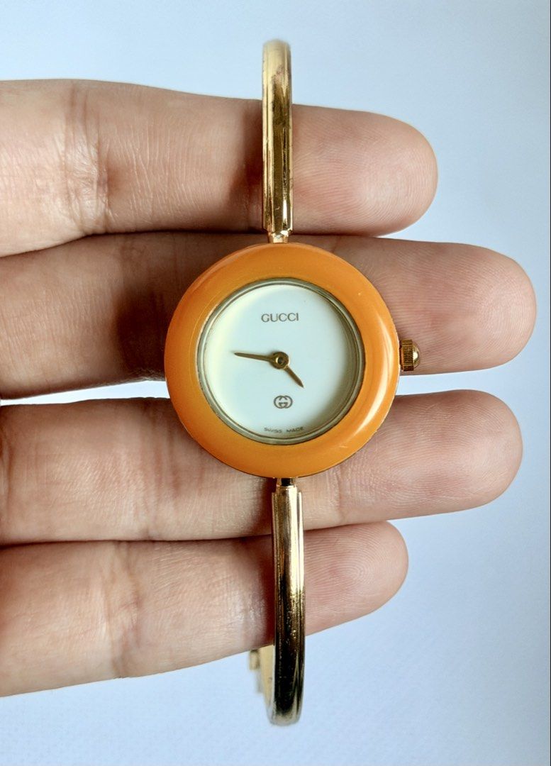 Gucci Interchangeable Bezel 11/12 (Category: Women's Watches) located in Manila. Submitted by vibeandvintage (Listing ID 1469452855, Image 1). Description: ⌚️Gucci Interchangeable Bezel 11/12 •Ladies •Quartz movement •Gold plated case and bracelet •White dial •Medium size bangle (6.5 inches) •26mm case diameter (excluding crown) •With signs of usage •All-original watch head and bangle •Good working condition •Complete 6 bezels and box 💵Price: ₱ 