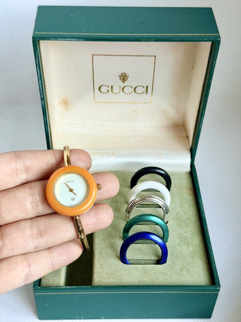 Gucci Interchangeable Bezel 11/12 (Category: Women's Watches) located in Manila. Submitted by vibeandvintage (Listing ID 1469452855, Image 3). Description: ⌚️Gucci Interchangeable Bezel 11/12 •Ladies •Quartz movement •Gold plated case and bracelet •White dial •Medium size bangle (6.5 inches) •26mm case diameter (excluding crown) •With signs of usage •All-original watch head and bangle •Good working condition •Complete 6 bezels and box 💵Price: ₱ 