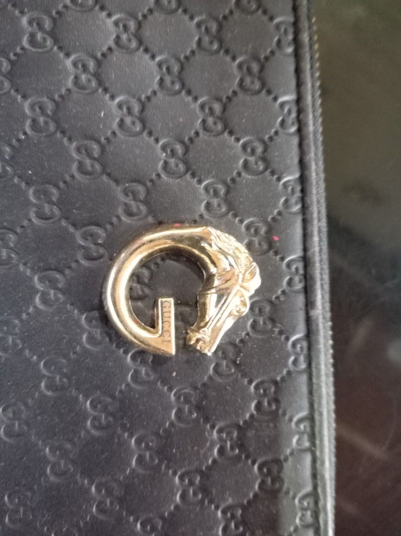 Gucci long wallet (Category: Luxury Bags & Wallets) located in Malaybalay. Submitted by cjsv0228 (Listing ID 1469482642, Image 2). Description: Gucci long wallet horse head logo 5way maraming malalagyan Issue minimal herline di halata kayu Na bahala magpa kintab Details on each Pic..