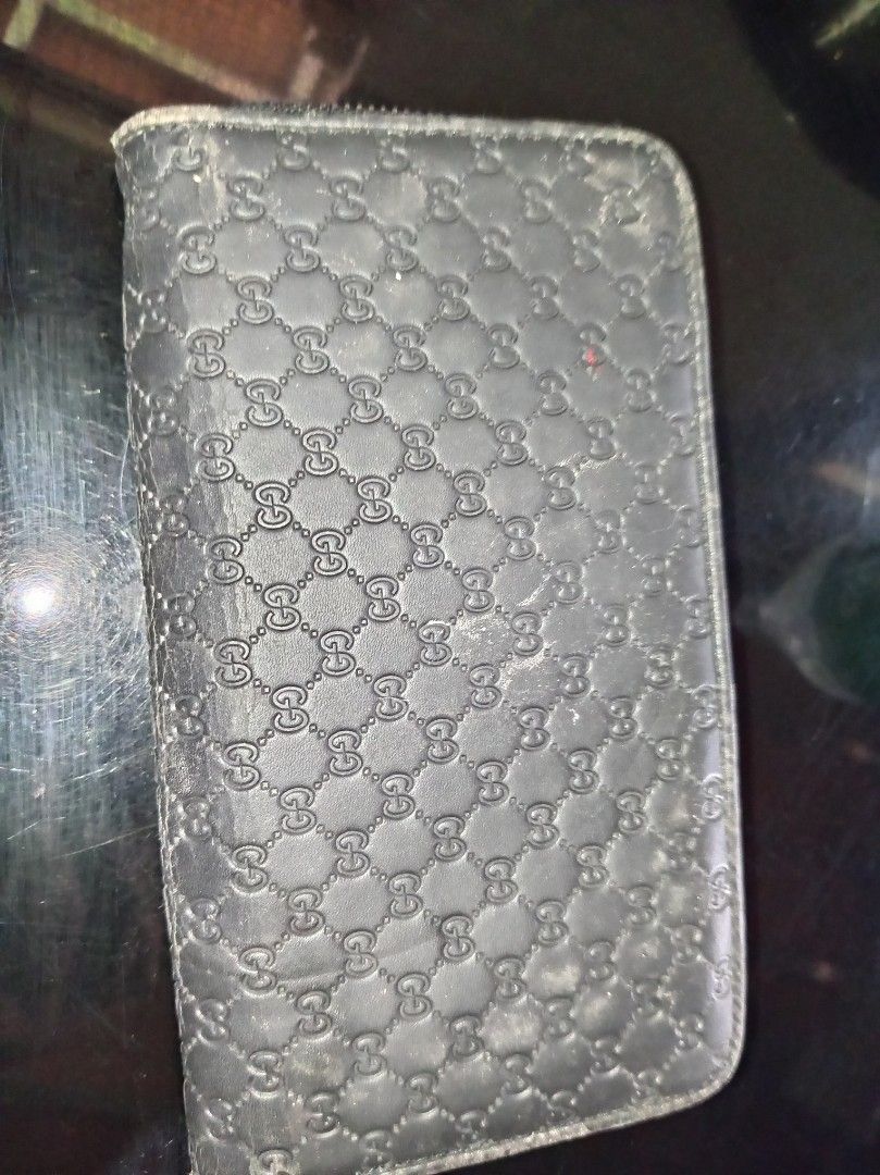 Gucci long wallet (Category: Luxury Bags & Wallets) located in Malaybalay. Submitted by cjsv0228 (Listing ID 1469482642, Image 3). Description: Gucci long wallet horse head logo 5way maraming malalagyan Issue minimal herline di halata kayu Na bahala magpa kintab Details on each Pic..